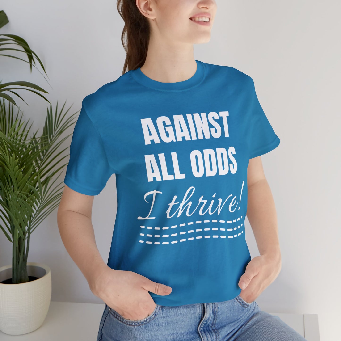 AGAINST ALL ODDS I THRIVE Unisex Jersey Short Sleeve Tee