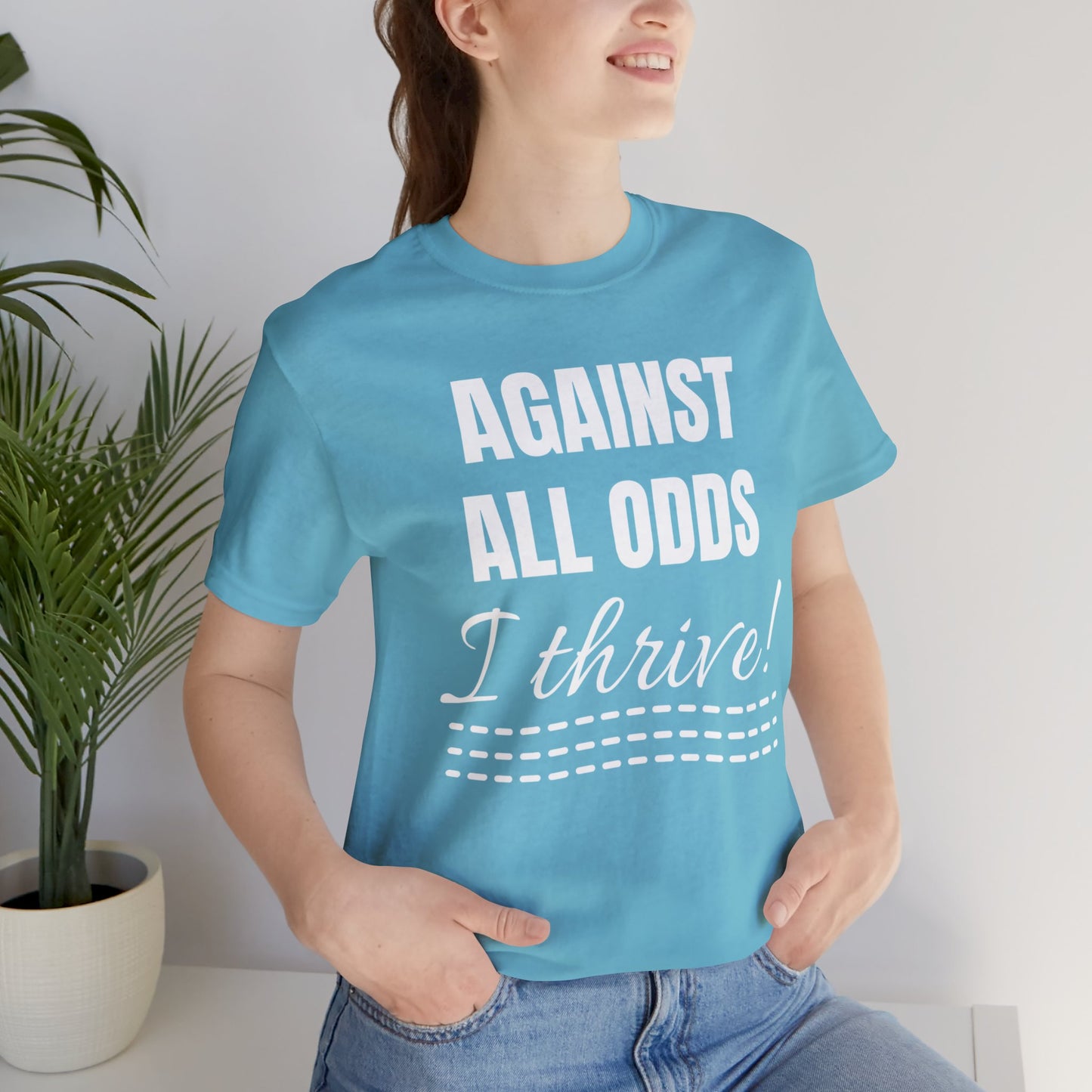 AGAINST ALL ODDS I THRIVE Unisex Jersey Short Sleeve Tee