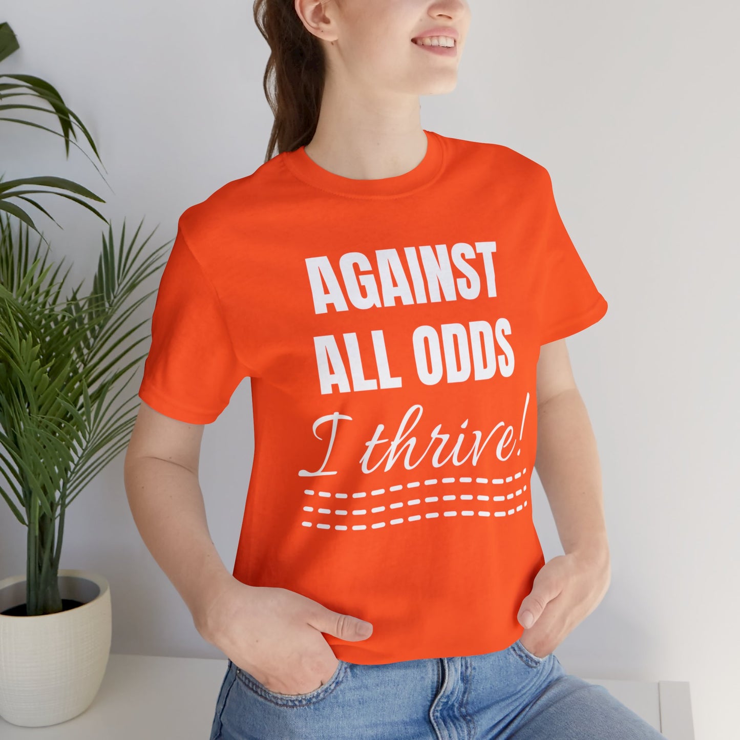 AGAINST ALL ODDS I THRIVE Unisex Jersey Short Sleeve Tee